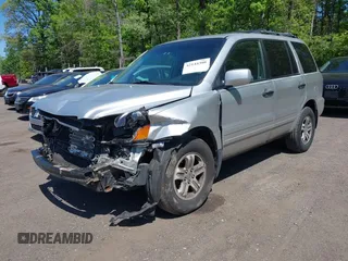 2005 Honda Pilot EX-L with VIN 5FNYF18595B009702, listed as a IAAI auction lot 42144308 with 163,363 mi miles. Bid and sale history available at carsss.com. Image 2.