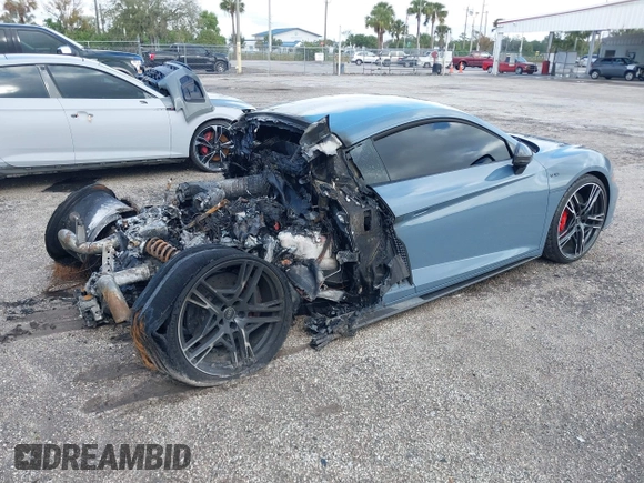 2021 Audi R8 z VIN WUAKBAFX5M7900468, wystawiony jako IAAI lot #41214857 z przebiegiem Nie podano mil oraz . Historia ofert i sprzedaży dostępna na DreamBid. Obrazek 4.