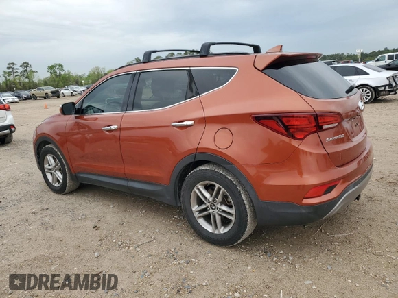 2017 Hyundai Santa Fe 2.4L z VIN 5XYZUDLB6HG411375, wystawiony jako Copart lot #50551165 z przebiegiem 35 597 mil mil oraz Czysty tytuł • Clean title. Historia ofert i sprzedaży dostępna na DreamBid. Obrazek 2.