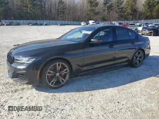 2023 BMW 5 Series M550i xDrive with VIN WBA13BK08PCM88687, listed as a Copart auction lot 88633545 with Not provided miles and Salvage title. Bid and sale history available at DreamBid. Image 1.