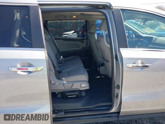 2018 Honda Odyssey EX-L with VIN 5FNRL6H75JB092633, listed as a IAAI auction lot 41971589 with 103,099 mi miles and . Bid and sale history available at DreamBid. Image 8.