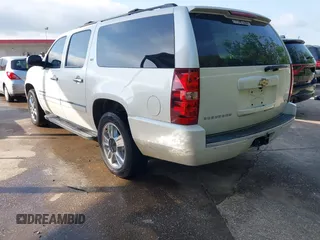 2010 Chevrolet Suburban LTZ with VIN 1GNUKKE38AR251895, listed as a IAAI auction lot 42020123 with 166,130 mi miles. Bid and sale history available at carsss.com. Image 3.