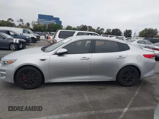 2018 Kia Optima S with VIN 5XXGT4L35JG216039, listed as a IAAI auction lot 42451216 with 91,679 mi miles and . Bid and sale history available at DreamBid. Image 14.