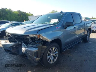 2021 Chevrolet Silverado 1500 RST with VIN 1GCUYEED3MZ112490, listed as a IAAI auction lot 41970233 with 65,509 mi miles and . Bid and sale history available at DreamBid. Image 2.