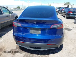 2024 Tesla Model Y Long Range with VIN 7SAYGDEE6RA242980, listed as a IAAI auction lot 40121685 with 9,126 mi miles and . Bid and sale history available at DreamBid. Image 17.
