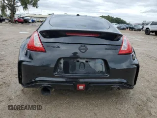 2009 Nissan 370Z Touring with VIN JN1AZ44E29M406023, listed as a Copart auction lot 73721324 with 108,072 mi miles and Salvage Title. Bid and sale history available at carsss.com. Image 6.