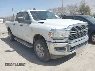 2023 Ram 2500 Big Horn with VIN 3C6UR5DL0PG544133, listed as a IAAI auction lot 41683879 with 57,265 mi miles. Bid and sale history available at carsss.com. Image 1.
