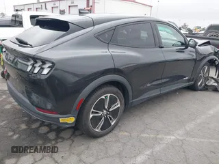 2022 Ford Mustang Mach-E Select z VIN 3FMTK1RM3NMA25588, wystawiony jako IAAI lot #42181256 z przebiegiem 44 753 mil mil oraz . Historia ofert i sprzedaży dostępna na DreamBid. Obrazek 4.