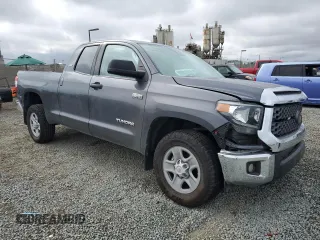 2021 Toyota Tundra SR with VIN 5TFRY5F18MX276548, listed as a Copart auction lot 55642695 with 90,413 mi miles and Salvage title. Bid and sale history available at DreamBid. Image 4.