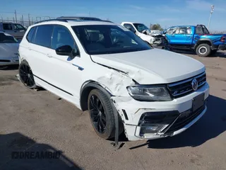2021 Volkswagen Tiguan SE z VIN 3VV2B7AX2MM017362, wystawiony jako IAAI lot #41156972 z przebiegiem 116 497 mil mil oraz . Historia ofert i sprzedaży dostępna na DreamBid. Obrazek 1.