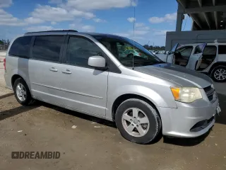 2012 Dodge Grand Caravan SXT with VIN 2C4RDGCG3CR373377, listed as a Copart auction lot 54604805 with 168,067 mi miles and Salvage Title. Bid and sale history available at DreamBid. Image 4.