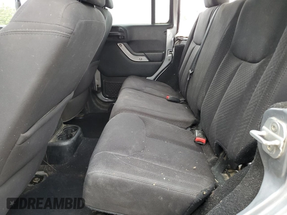 2013 Jeep Wrangler Unlimited Sport с VIN 1C4BJWDG1DL635698, выставлен на аукционе Copart как лот 57111835 с пробегом 185 759 миль миль и Списание • Salvage title. История ставок и продаж доступна на DreamBid. Изображение 10.