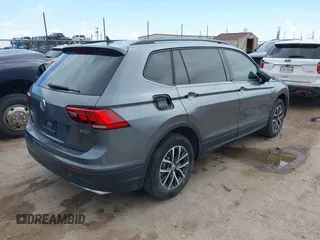 2021 Volkswagen Tiguan S with VIN 3VV0B7AX0MM017433, listed as a IAAI auction lot 42017125 with 54,624 mi miles and . Bid and sale history available at DreamBid. Image 4.