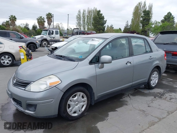 2011 Nissan Versa 1.8 S with VIN 3N1BC1AP0BL461824, listed as a IAAI auction lot 42076994 with 180,798 mi miles. Bid and sale history available at carsss.com. Image 6.