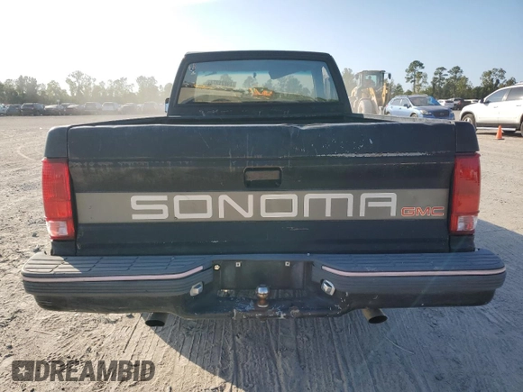 1991 GMC Sonoma with VIN 1GTCS14RXM2559524, listed as a Copart auction lot 79871374 with 228,691 mi miles and Salvage Title. Bid and sale history available at DreamBid. Image 6.