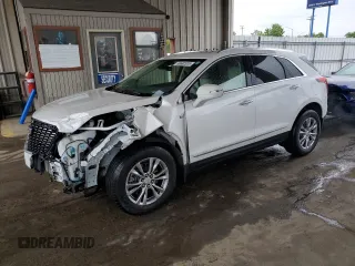 2021 Cadillac XT5 AWD Premium Luxury z VIN 1GYKNDRS1MZ191350, wystawiony jako Copart lot #56692835 z przebiegiem 20 259 mil mil oraz Szkody całkowita. Historia ofert i sprzedaży dostępna na DreamBid. Obrazek 1.