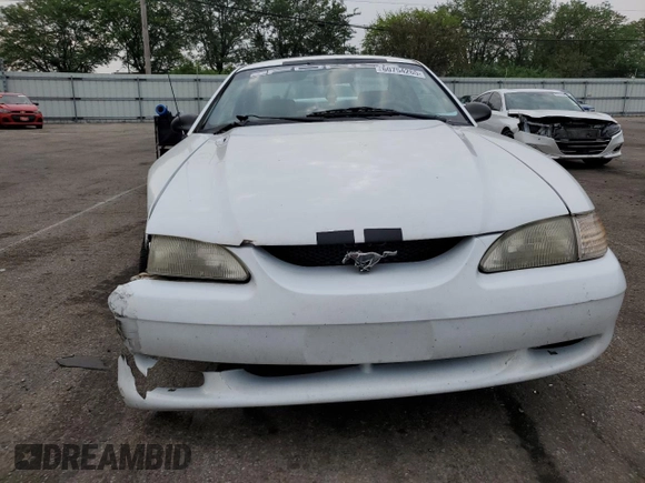 1997 Ford Mustang with VIN 1FALP4046VF180467, listed as a Copart auction lot 60754265 with 154,676 mi miles and Salvage title. Bid and sale history available at DreamBid. Image 5.