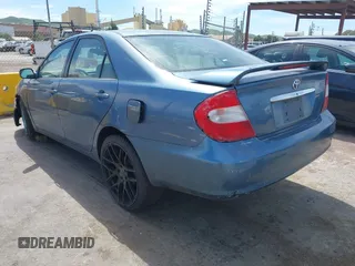 2004 Toyota Camry LE with VIN 4T1BE32K14U793314, listed as a IAAI auction lot 42031924 with 169,164 mi miles. Bid and sale history available at carsss.com. Image 3.