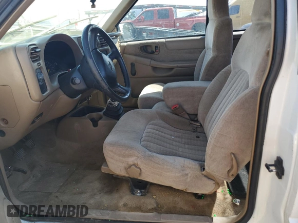 2001 Chevrolet S-10 LS with VIN 1GCCS19531K129710, listed as a Copart auction lot 69585404 with 163,904 mi miles and Salvage Title. Bid and sale history available at DreamBid. Image 7.