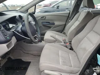 2010 Honda Insight LX with VIN JHMZE2H56AS022299, listed as a Copart auction lot 54872215 with 149,514 mi miles and Salvage title. Bid and sale history available at DreamBid. Image 7.