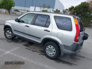 2002 Honda CR-V LX with VIN JHLRD68422C008983, listed as a IAAI auction lot 42112835 with 198,114 mi miles and . Bid and sale history available at carsss.com. Image 3.