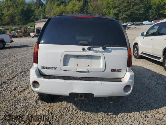 2005 GMC Envoy SLT with VIN 1GKDT13S552329269, listed as a Copart auction lot 69209244 with 154,595 mi miles and Salvage Title. Bid and sale history available at carsss.com. Image 6.
