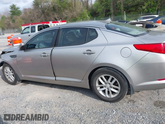 2012 Kia Optima LX with VIN KNAGM4A78C5283175, listed as a IAAI auction lot 42075886 with 123,112 mi miles and . Bid and sale history available at carsss.com. Image 14.