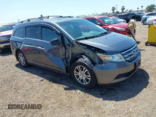 2011 Honda Odyssey EX-L with VIN 5FNRL5H66BB070787, listed as a IAAI auction lot 41977698 with 108,065 mi miles and . Bid and sale history available at carsss.com. Image 1.