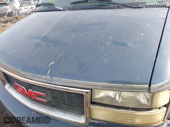 2002 GMC Safari z VIN 1GDDM19X22B514706, wystawiony jako IAAI lot #41647881 z przebiegiem Nie podano mil oraz . Historia ofert i sprzedaży dostępna na DreamBid. Obrazek 10.