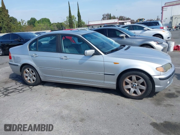 2002 BMW 3 Series 325i with VIN WBAET37492NG83135, listed as a IAAI auction lot 42028502 with 184,216 mi miles. Bid and sale history available at carsss.com. Image 13.