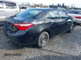 2018 Toyota Corolla L z VIN 2T1BURHEXJC098138, wystawiony jako IAAI lot #41935621 z przebiegiem 103 937 mil mil oraz . Historia ofert i sprzedaży dostępna na DreamBid. Obrazek 4.