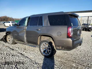 2015 GMC Yukon SLT with VIN 1GKS1BKC8FR664001, listed as a Copart auction lot 84391784 with 0 mi miles and Salvage Title. Bid and sale history available at carsss.com. Image 2.