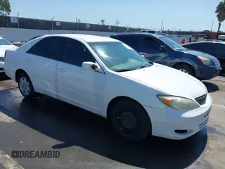 2002 Toyota Camry LE z VIN JTDBE32K720020808, wystawiony jako IAAI lot #41849196 z przebiegiem 150 546 mil mil oraz . Historia ofert i sprzedaży dostępna na DreamBid. Obrazek 1.