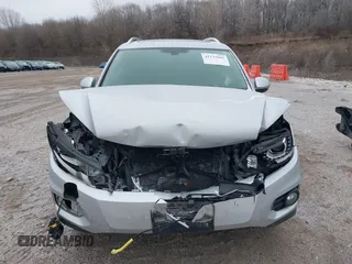2016 Volkswagen Tiguan SEL z VIN WVGBV7AX3GW594729, wystawiony jako IAAI lot #41233805 z przebiegiem 92 997 mil mil oraz . Historia ofert i sprzedaży dostępna na DreamBid. Obrazek 12.