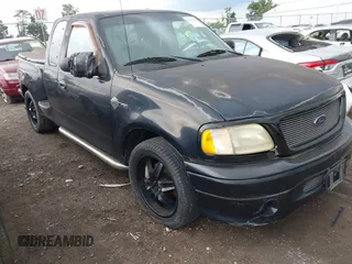 2000 Ford F-150 XL z VIN 2FTRX07L3YCB03694, wystawiony jako IAAI lot #42713596 z przebiegiem Nie podano mil oraz . Historia ofert i sprzedaży dostępna na DreamBid. Obrazek 1.