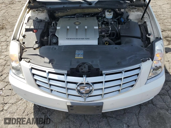 2006 Cadillac DTS 1SB z VIN 1G6KD57Y36U144765, wystawiony jako Copart lot #50603475 z przebiegiem 105 637 mil mil oraz Czysty tytuł • Clean title. Historia ofert i sprzedaży dostępna na DreamBid. Obrazek 11.