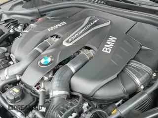 2018 BMW 5 Series M550i xDrive с VIN WBAJB9C5XJB286923, выставлен на аукционе IAAI как лот 42527301 с пробегом 76 923 миль миль и . История ставок и продаж доступна на DreamBid. Изображение 24.