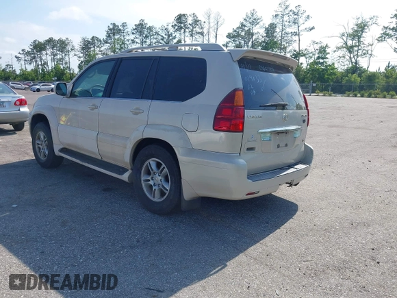 2003 Lexus GX 470 with VIN JTJBT20X630019033, listed as a IAAI auction lot 42128698 with 286,811 mi miles and . Bid and sale history available at DreamBid. Image 3.