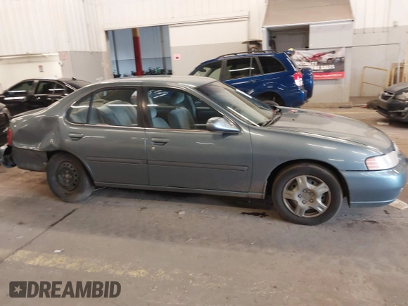 2000 Nissan Altima XE with VIN 1N4DL01D4YC185986, listed as a IAAI auction lot 41831774 with 217,044 mi miles. Bid and sale history available at carsss.com. Image 14.