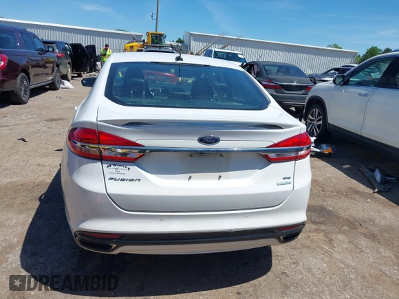 2017 Ford Fusion SE z VIN 3FA6P0H90HR246900, wystawiony jako IAAI lot #42169109 z przebiegiem 178 878 mil mil oraz . Historia ofert i sprzedaży dostępna na DreamBid. Obrazek 17.