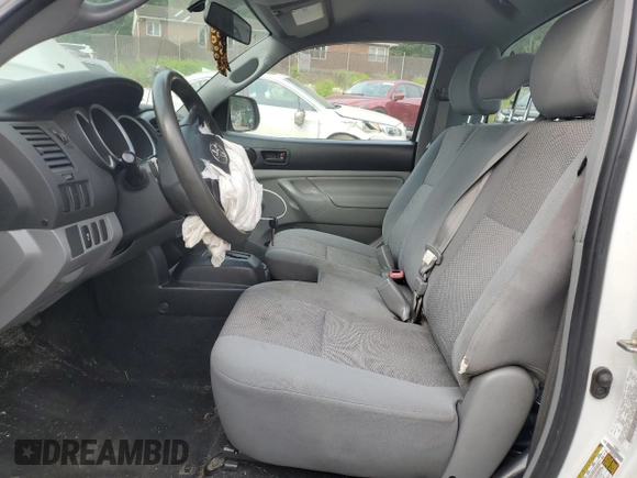 2014 Toyota Tacoma with VIN 5TFNX4CN7EX037335, listed as a Copart auction lot 60733635 with 115,341 mi miles and Salvage title. Bid and sale history available at DreamBid. Image 7.