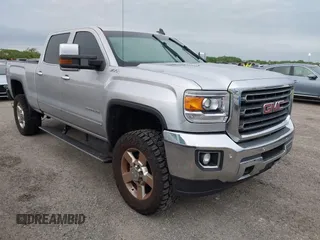 2016 GMC Sierra 2500HD SLT z VIN 1GT12TE89GF183548, wystawiony jako IAAI lot #40476400 z przebiegiem 203 148 mil mil oraz . Historia ofert i sprzedaży dostępna na DreamBid. Obrazek 1.