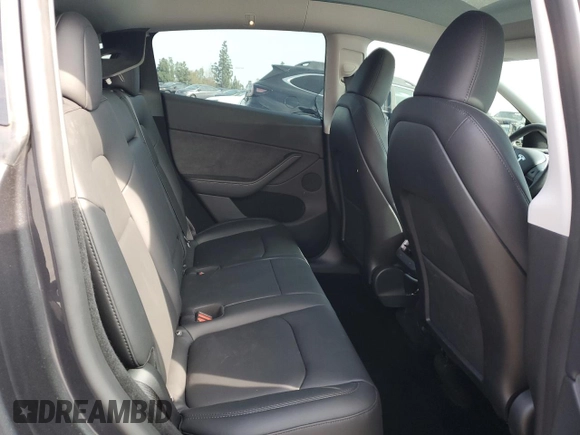 2024 Tesla Model Y Long Range with VIN 7SAYGDEE2RA244242, listed as a Copart auction lot 52635095 with 4,994 mi miles and Salvage title. Bid and sale history available at DreamBid. Image 12.