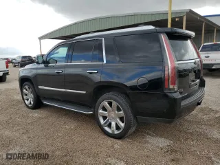 2020 Cadillac Escalade Premium Luxury with VIN 1GYS4CKJ0LR243080, listed as a Copart auction lot 43666095 with 87,076 mi miles and Clean Title. Bid and sale history available at carsss.com. Image 2.