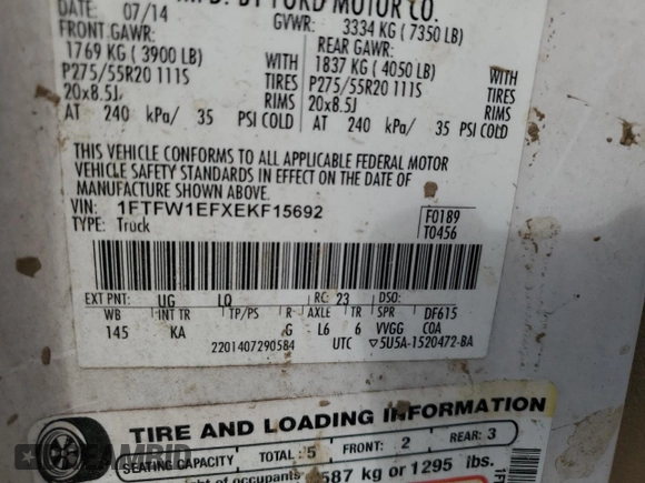 2014 Ford F-150 XL with VIN 1FTFW1EFXEKF15692, listed as a Copart auction lot 61142145 with 215,008 mi miles and Salvage title. Bid and sale history available at DreamBid. Image 12.