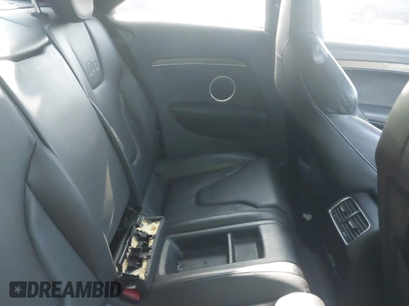 2009 Audi S5 z VIN WAURV78T99A036807, wystawiony jako IAAI lot #42352152 z przebiegiem 122 196 mil mil oraz . Historia ofert i sprzedaży dostępna na DreamBid. Obrazek 8.