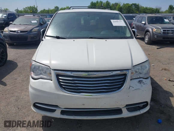 2012 Chrysler Town & Country Touring L with VIN 2C4RC1CG7CR156415, listed as a IAAI auction lot 42045371 with 233,306 mi miles and . Bid and sale history available at carsss.com. Image 6.