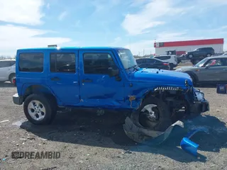 2015 Jeep Wrangler Unlimited Sahara z VIN 1C4HJWEG5FL650829, wystawiony jako IAAI lot #41824739 z przebiegiem 127 719 mil mil oraz . Historia ofert i sprzedaży dostępna na DreamBid. Obrazek 13.