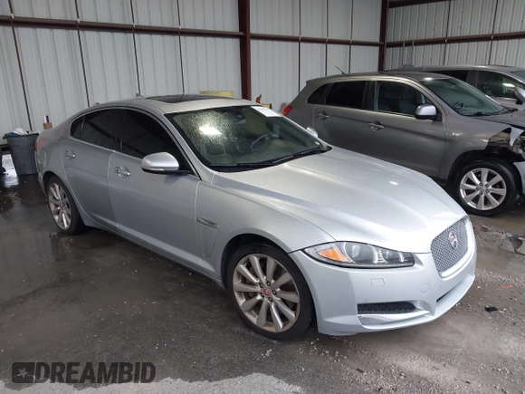 2014 Jaguar XF V6 SC with VIN SAJWJ0EF9E8U17227, listed as a IAAI auction lot 40455665 with 125,196 mi miles. Bid and sale history available at carsss.com. Image 1.