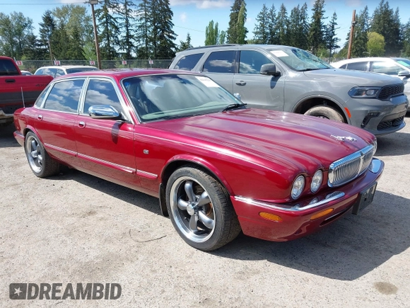 1998 Jaguar XJ Vanden Plas with VIN SAJKX6249WC844067, listed as a IAAI auction lot 42145235 with 117,142 mi miles and . Bid and sale history available at DreamBid. Image 1.